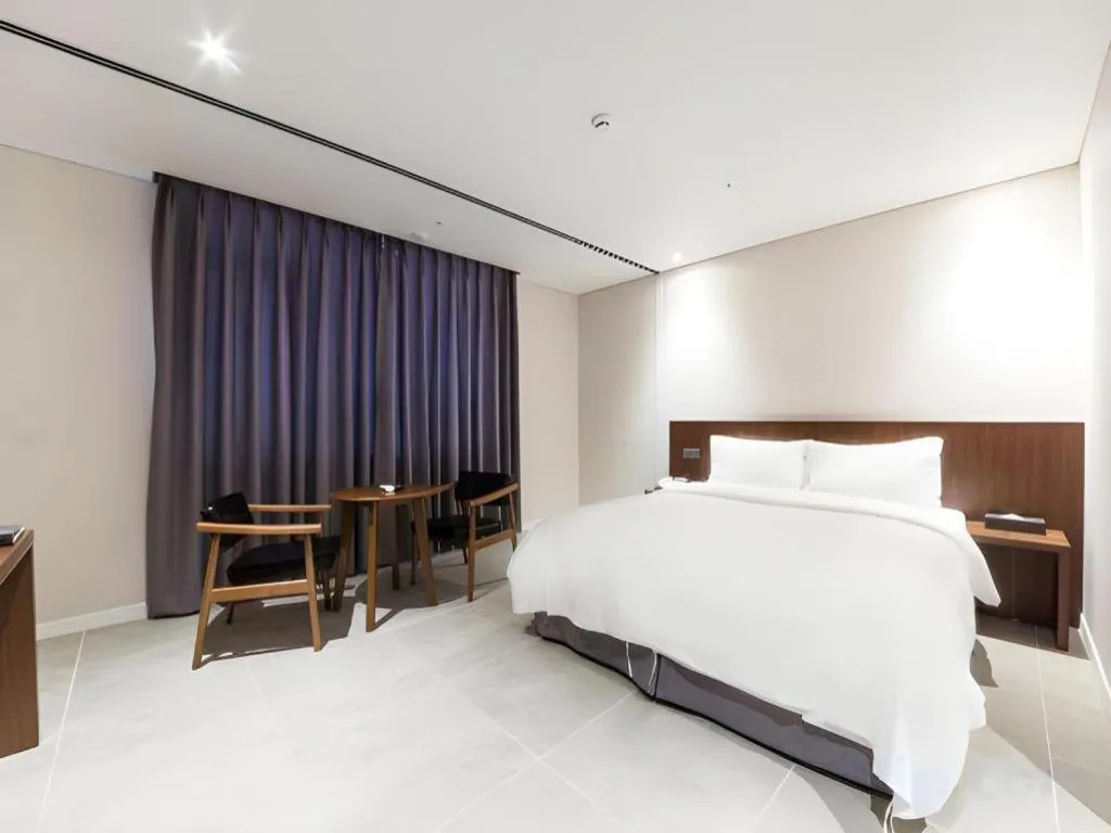 Bed in CS Premier Hotel