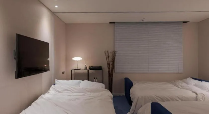 Bed in CS Premier Hotel