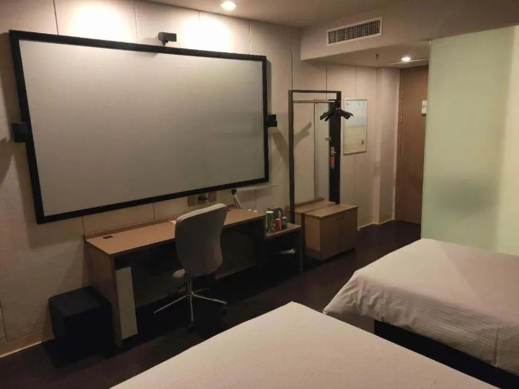 Bed in Jinjiang Inn Select Shenyang Tawan Xingshun Night Market Metro Station