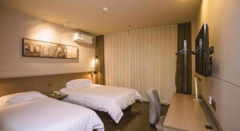 Bed in Jinjiang Inn Select Shenyang Tawan Xingshun Night Market Metro Station