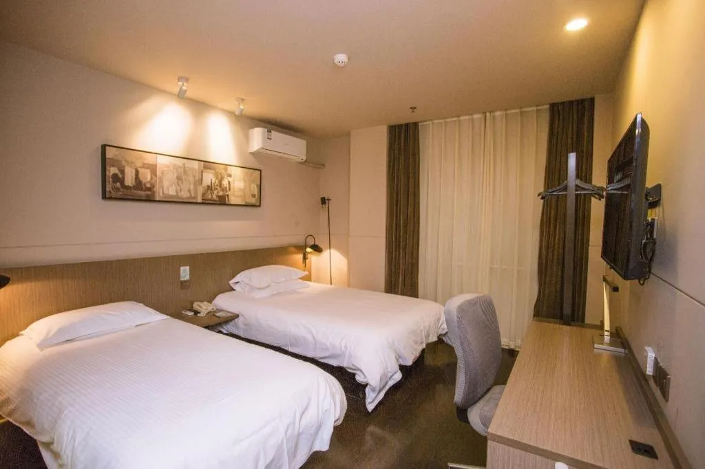 Bed in Jinjiang Inn Select Shenyang Tawan Xingshun Night Market Metro Station