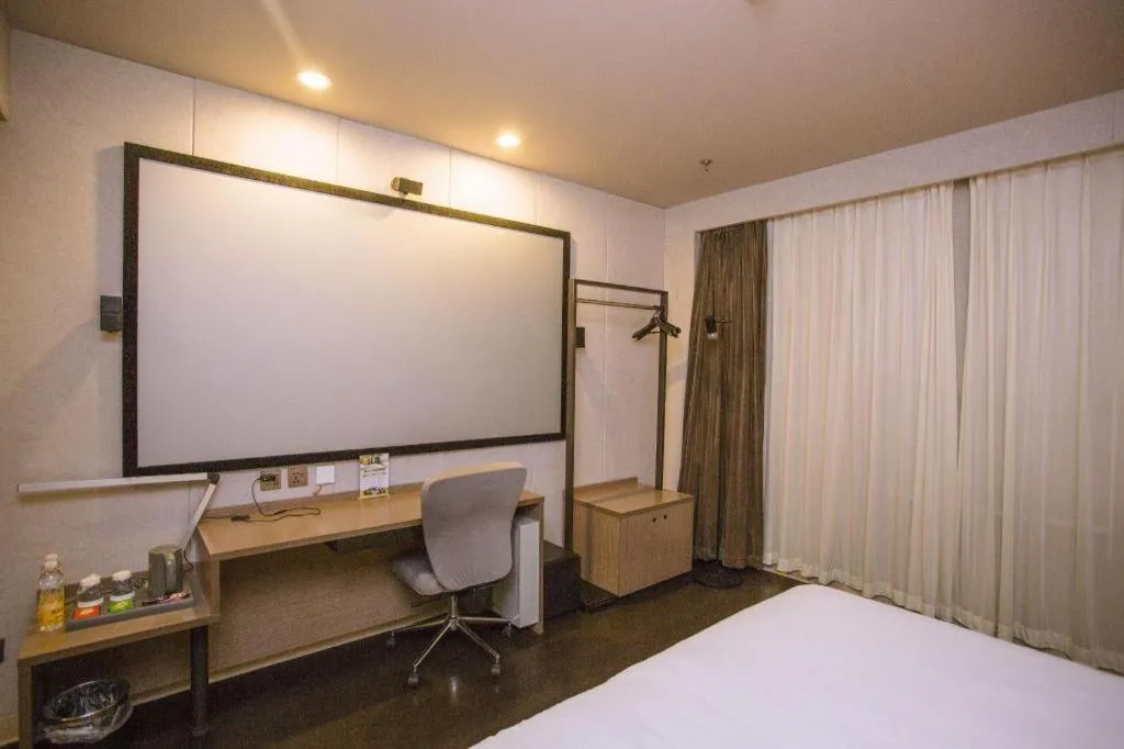 Bed in Jinjiang Inn Select Shenyang Tawan Xingshun Night Market Metro Station