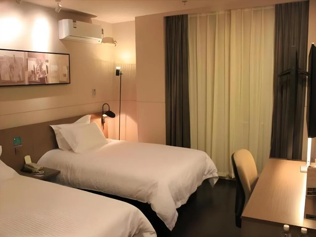 Bed in Jinjiang Inn Select Shenyang Tawan Xingshun Night Market Metro Station