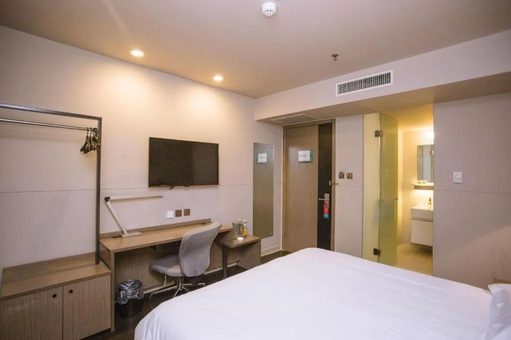 Bed in Jinjiang Inn Select Shenyang Tawan Xingshun Night Market Metro Station