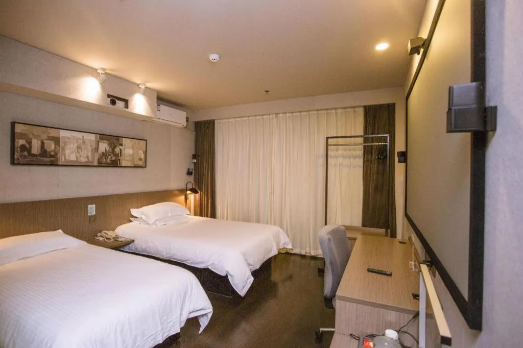 Bed in Jinjiang Inn Select Shenyang Tawan Xingshun Night Market Metro Station