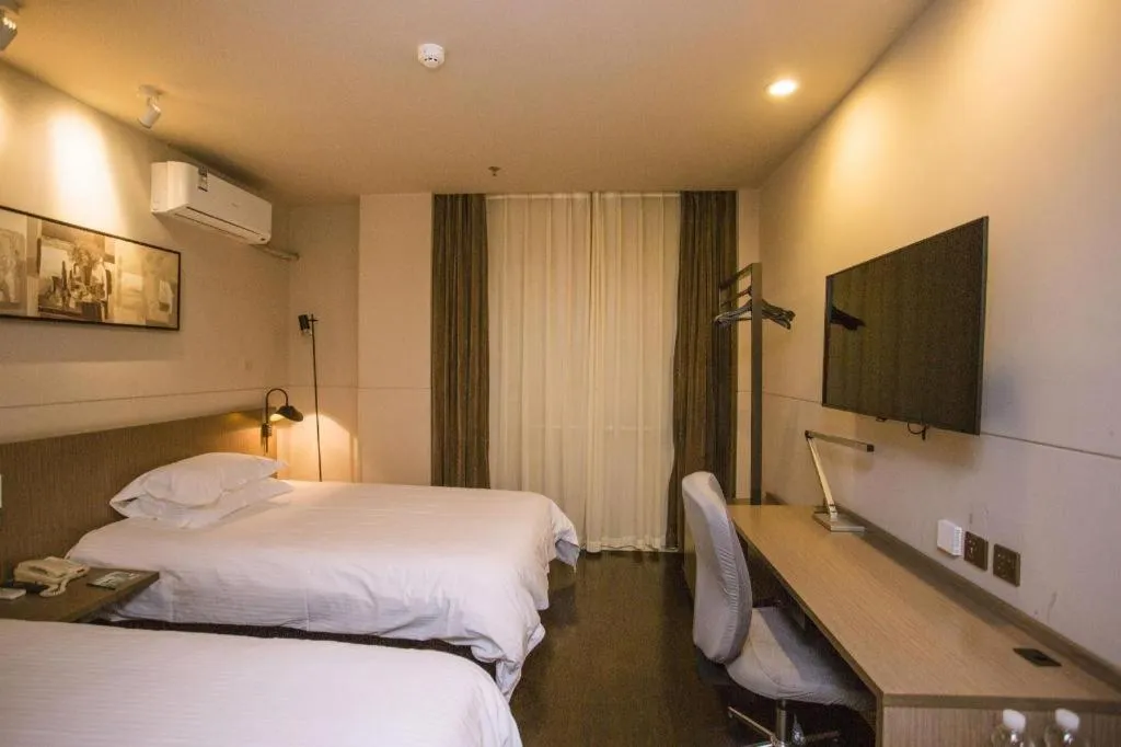 Bed in Jinjiang Inn Select Shenyang Tawan Xingshun Night Market Metro Station