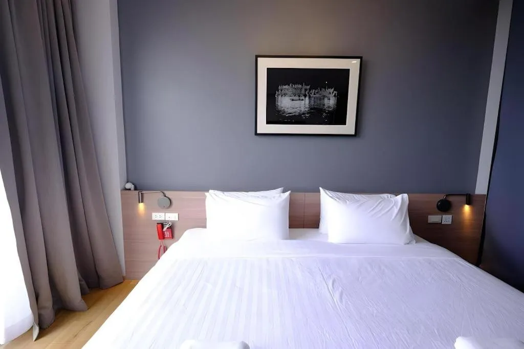 Bed in R Photo Hotel