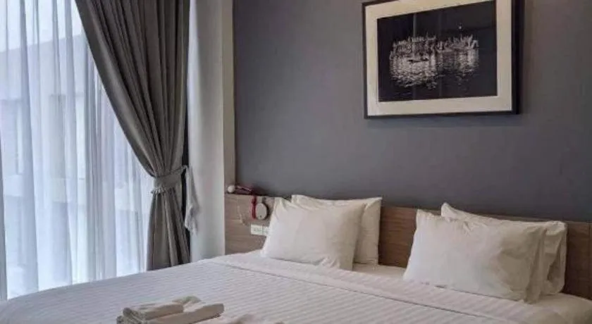 Bed in R Photo Hotel