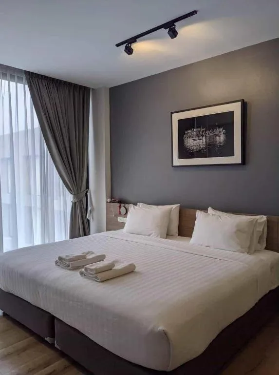 Bed in R Photo Hotel