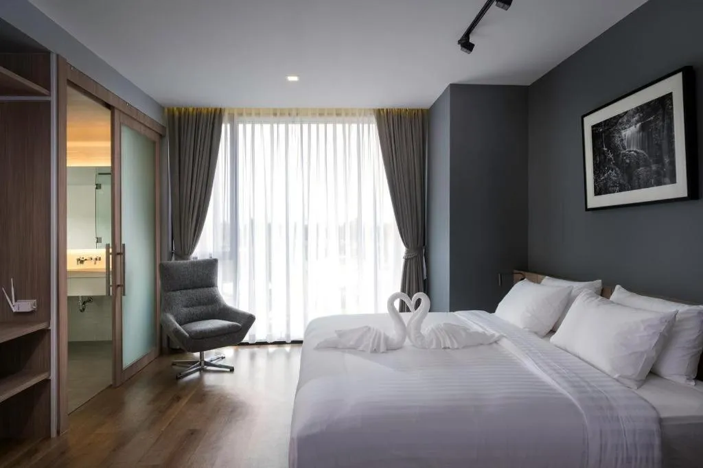 Bed in R Photo Hotel