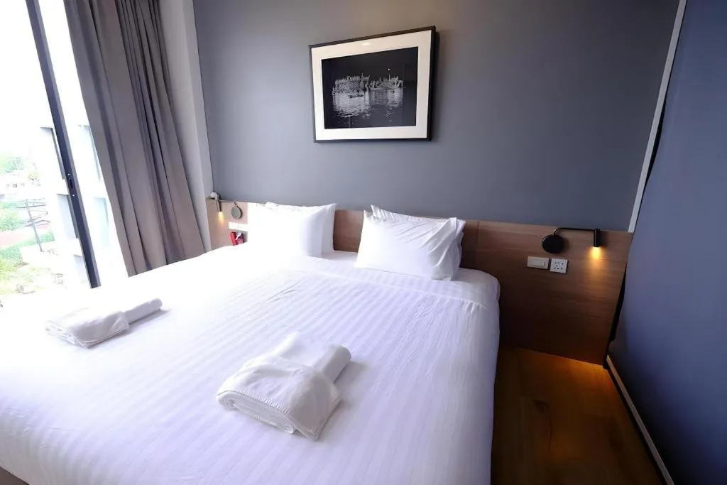 Bed in R Photo Hotel