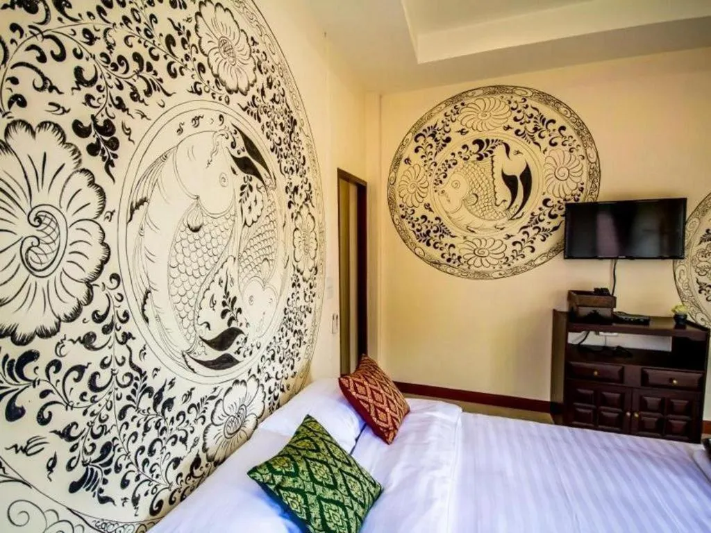 Bed in Wake Up at Muang Kao Boutique Hotel