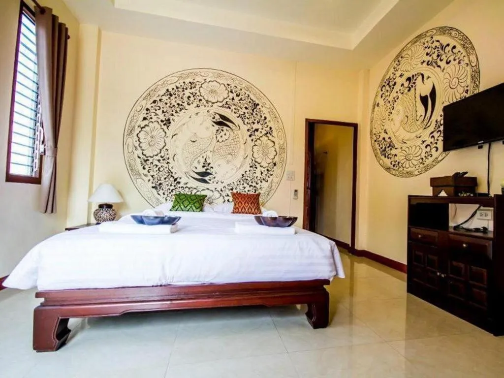 Bed in Wake Up at Muang Kao Boutique Hotel