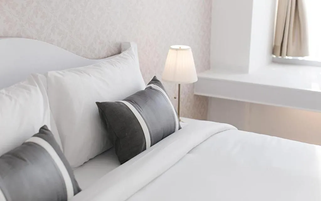 Bed in B2 Hua Hin Premier Hotel