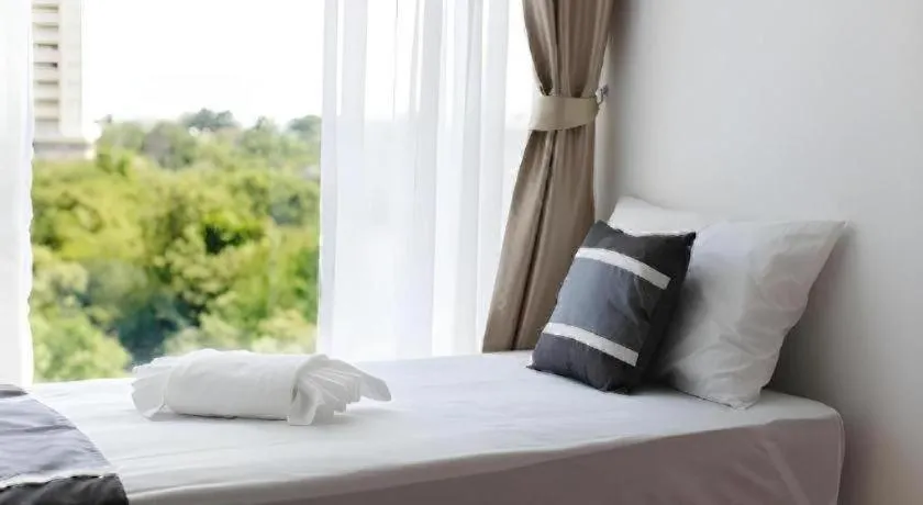 Bed in B2 Hua Hin Premier Hotel