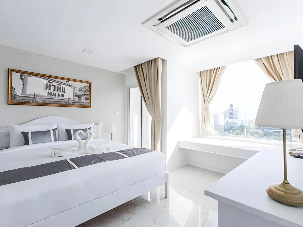 Bed in B2 Hua Hin Premier Hotel