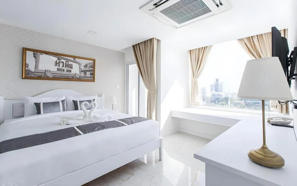 Bed in B2 Hua Hin Premier Hotel