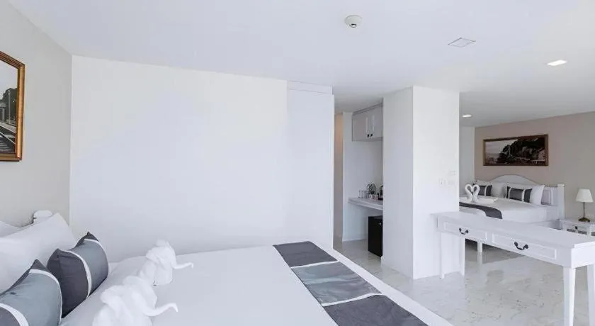 Bed in B2 Hua Hin Premier Hotel