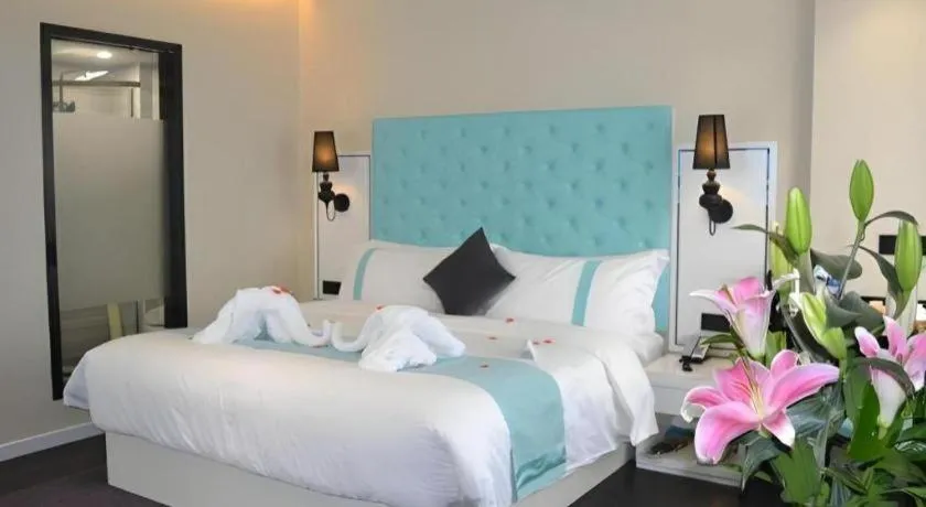 Bed in Xana Hotelle Beijing Qianmen Footbridge Metro Station