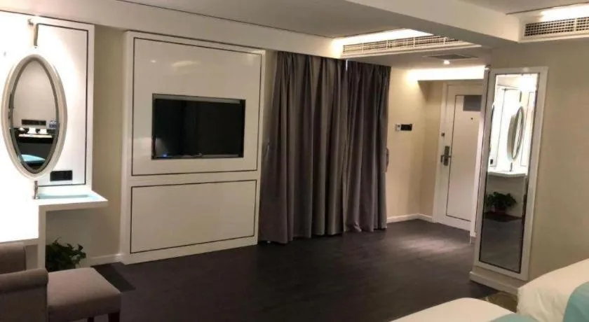 Bed in Xana Hotelle Beijing Qianmen Footbridge Metro Station