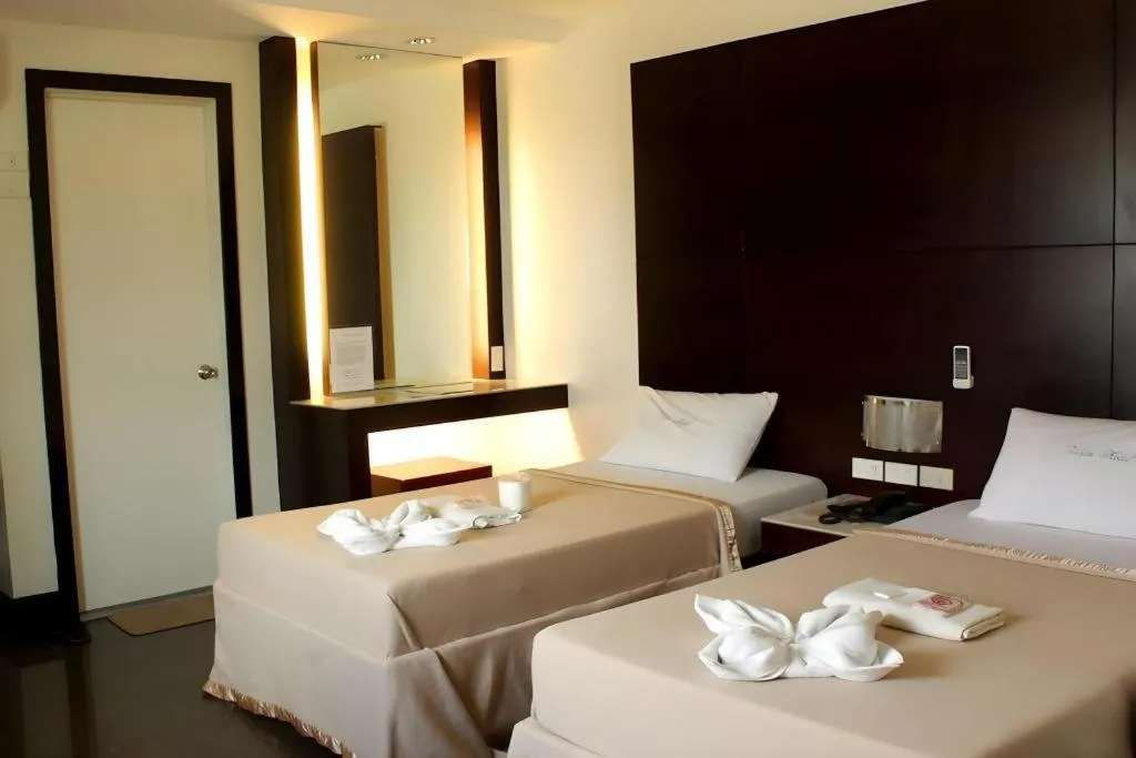 Bed in Vista Hotel Cubao