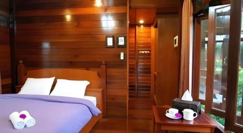 Bed in Baansuan Amphawan Resort