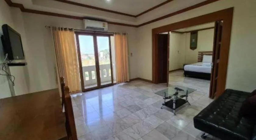 Bed in AmornSukhothai Hotel