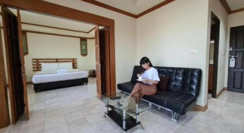 Bed in AmornSukhothai Hotel