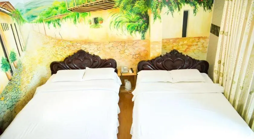 Bed in Phuong Linh Hotel