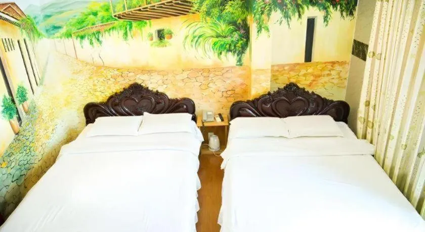Bed in Phuong Linh Hotel
