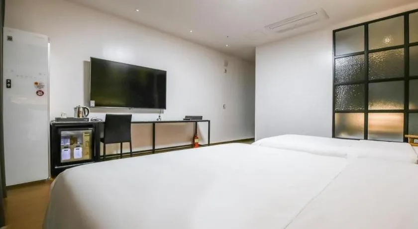 Bed in Hotel Morning Calm