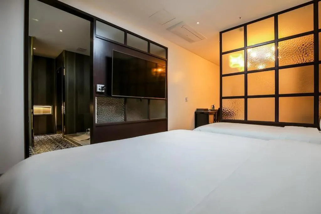 Bed in Hotel Morning Calm