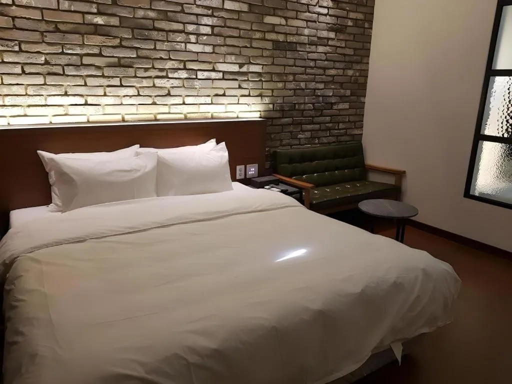 Bed in Hotel Morning Calm