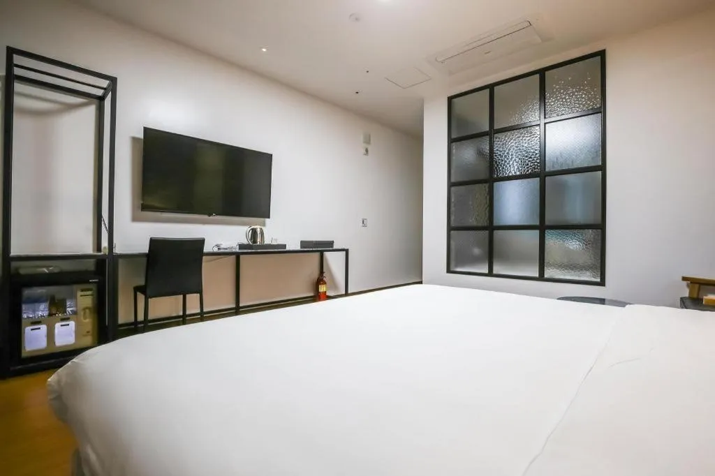 Bed in Hotel Morning Calm