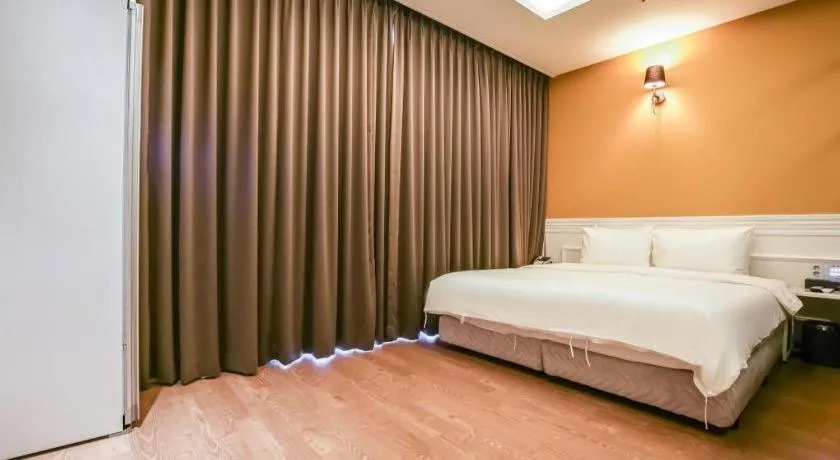 Bed in Hotel Morning Calm