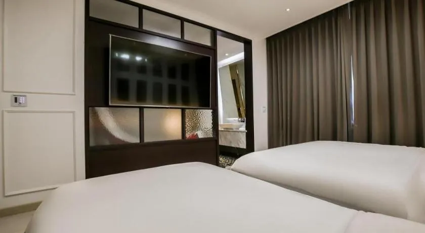 Bed in Hotel Morning Calm