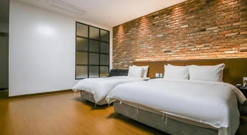 Bed in Hotel Morning Calm