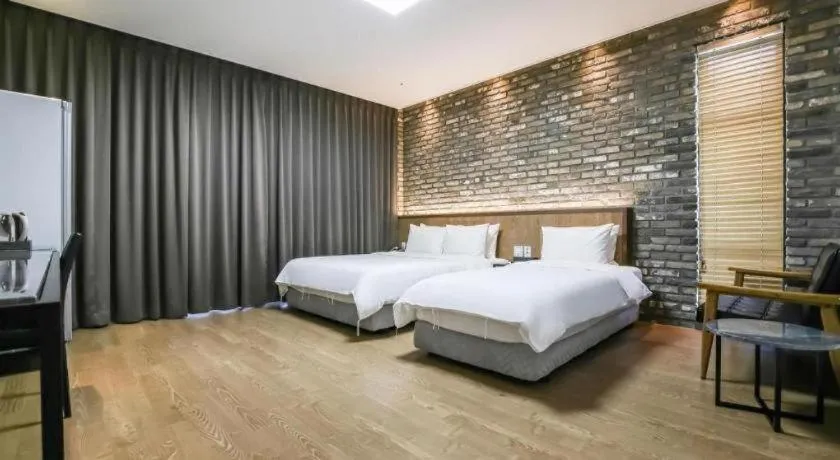 Bed in Hotel Morning Calm