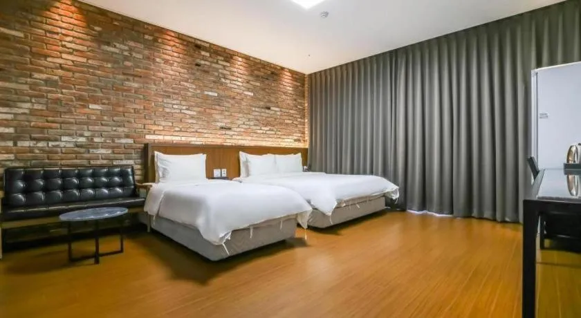 Bed in Hotel Morning Calm