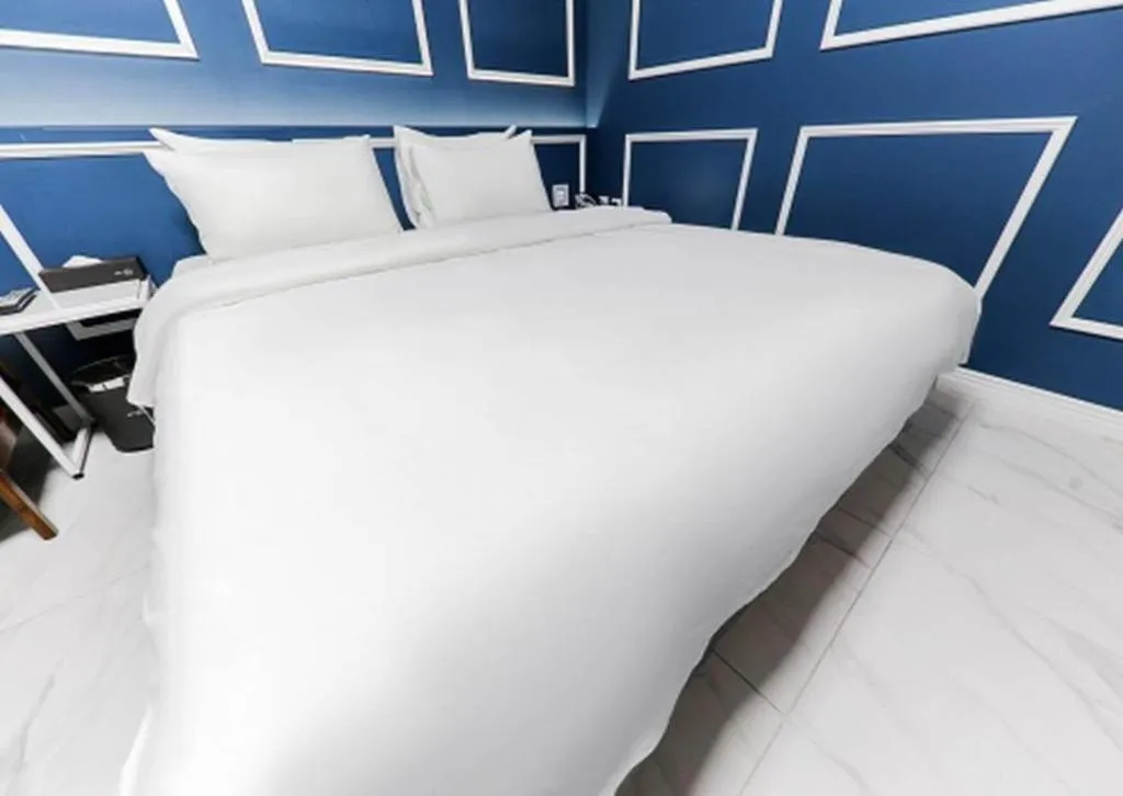 Bed in Hotel Morning Calm