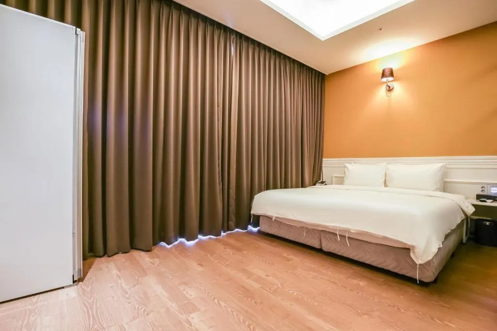 Bed in Hotel Morning Calm