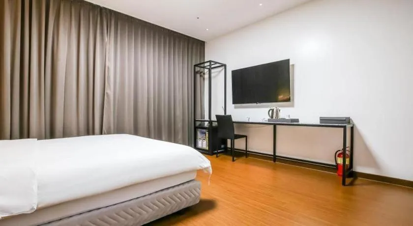 Bed in Hotel Morning Calm