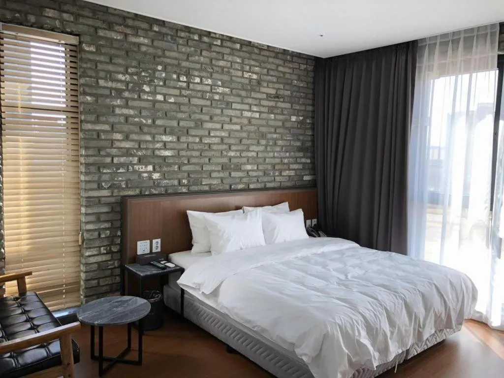 Bed in Hotel Morning Calm