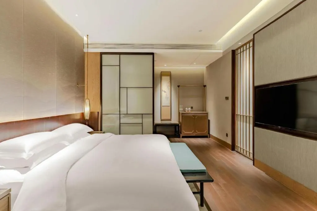 Bed in Wuxi Shanse Hotel