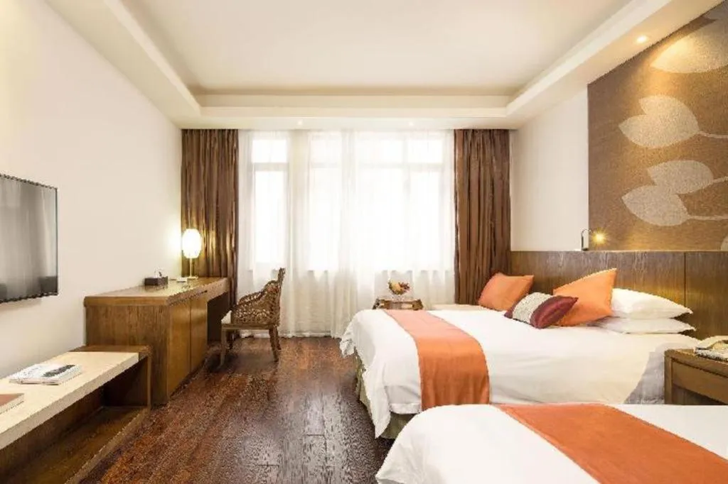 Bed in Wuxi Shanse Hotel