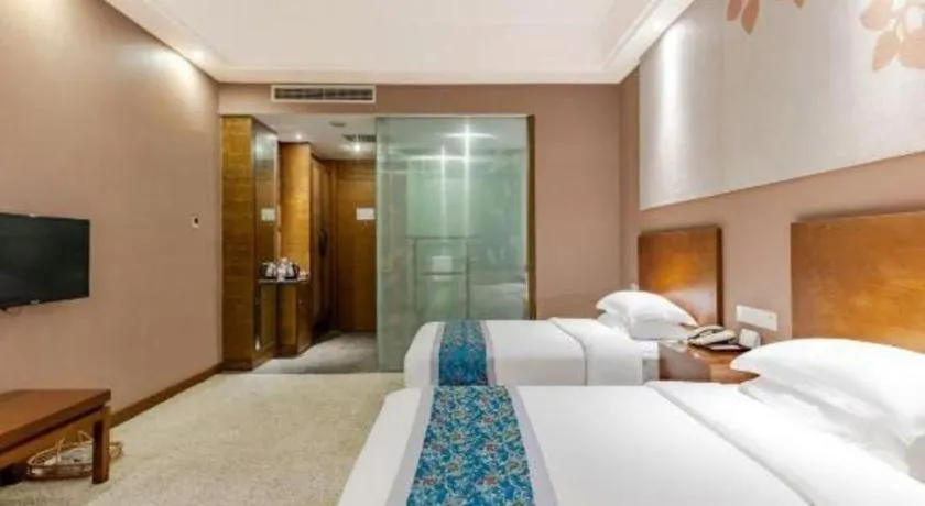 Bed in Wuxi Shanse Hotel