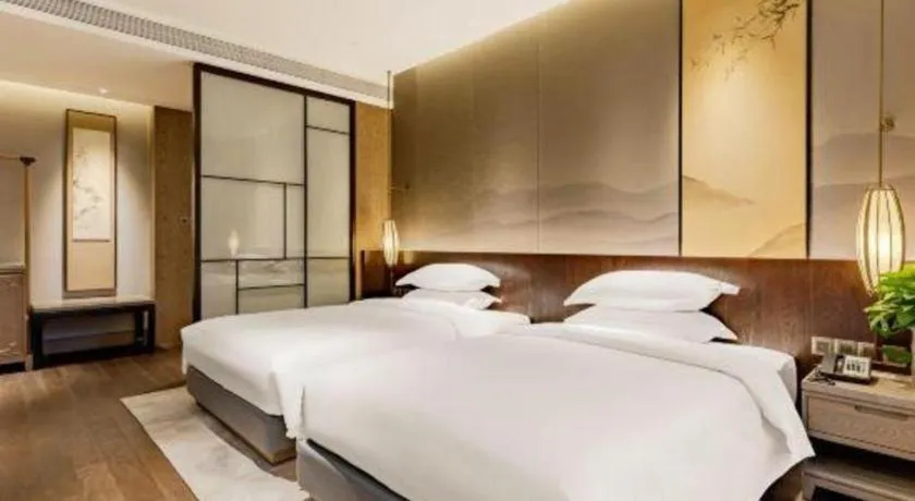 Bed in Wuxi Shanse Hotel