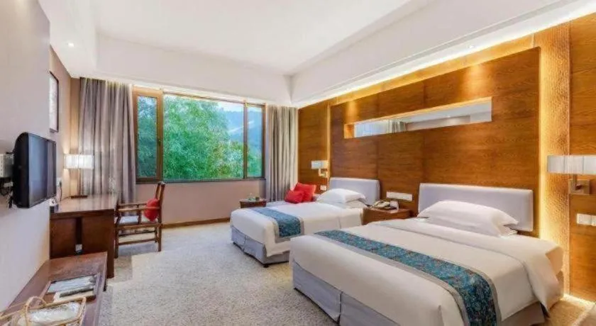 Bed in Wuxi Shanse Hotel