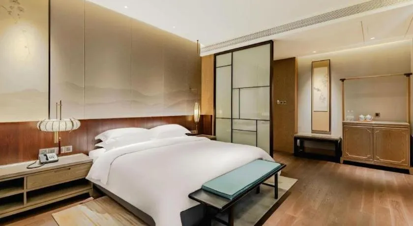 Bed in Wuxi Shanse Hotel