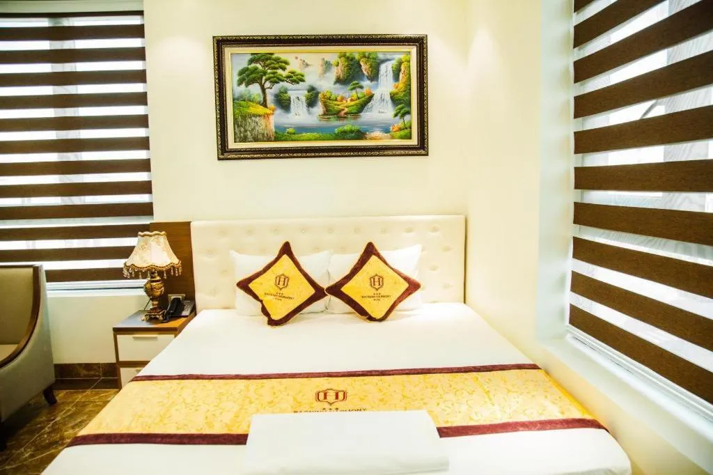 Bed in BACNINH HARMONY HOTEL